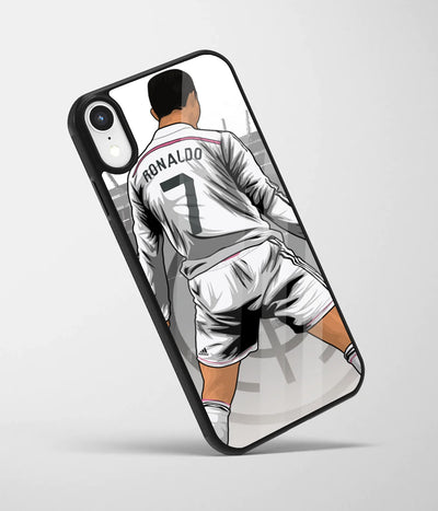 An angled view of a glass phone case featuring a vibrant design.