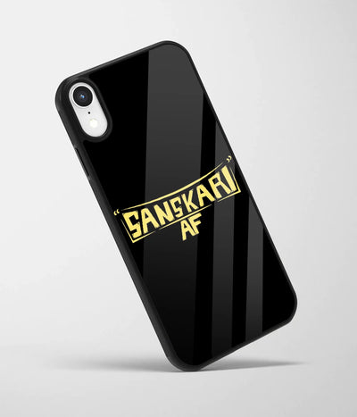 An angled view of a glass phone case featuring a vibrant design.