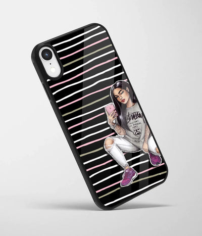 An angled view of a glass phone case featuring a vibrant design.