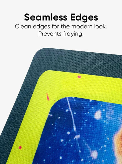 Close-up shot demonstrating the seamless, laser-cut edges of the desk mat designed to prevent fraying.