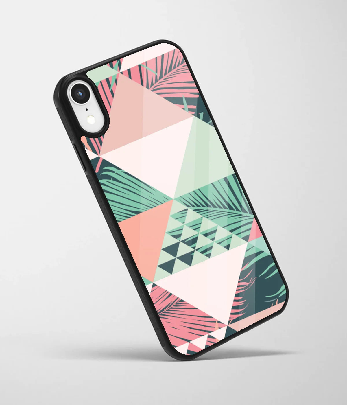 An angled view of a glass phone case featuring a vibrant design.
