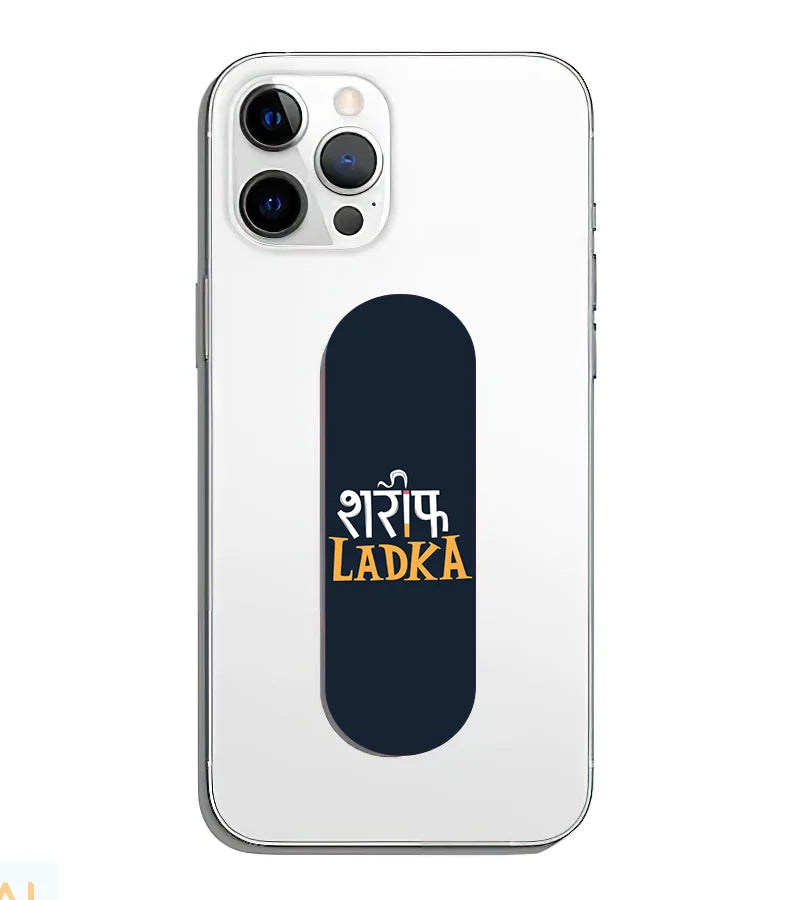 A phone grip slider applied to the back of a smartphone.