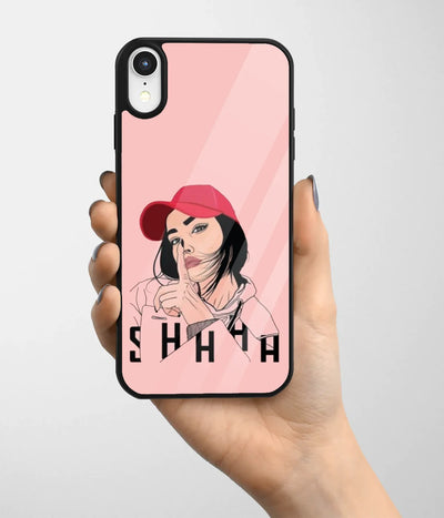 A hand holding a glass phone case with a colorful design.