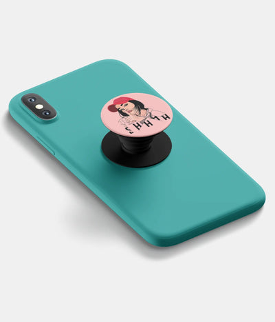 A top-down view of a phone grip holder attached to a mobile phone case on a white background