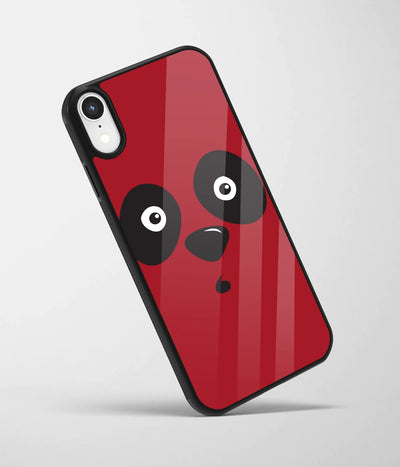 An angled view of a glass phone case featuring a vibrant design.