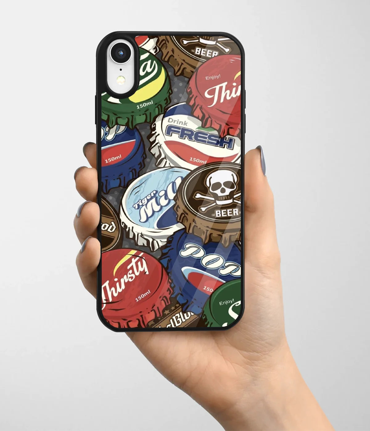 A hand holding a glass phone case with a colorful design.