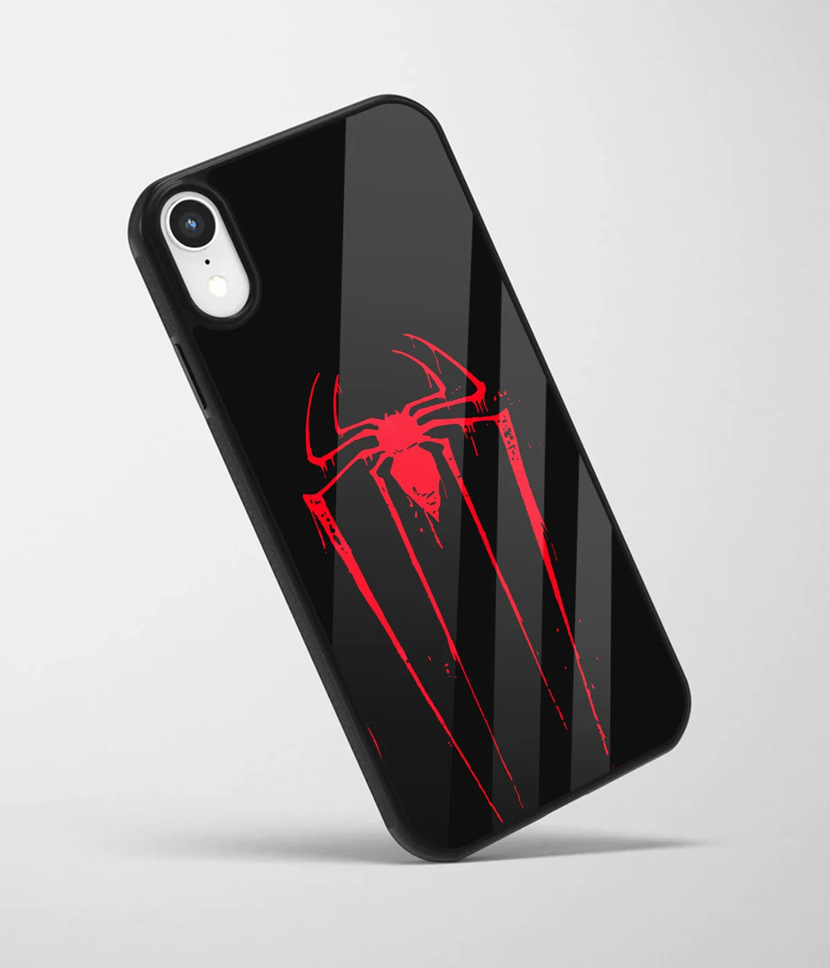 An angled view of a glass phone case featuring a vibrant design.
