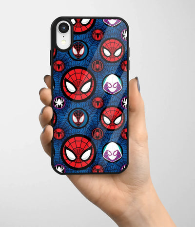 A hand holding a glass phone case with a colorful design.