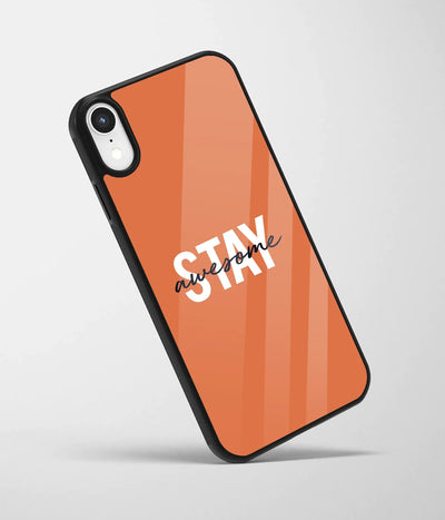 An angled view of a glass phone case featuring a vibrant design.