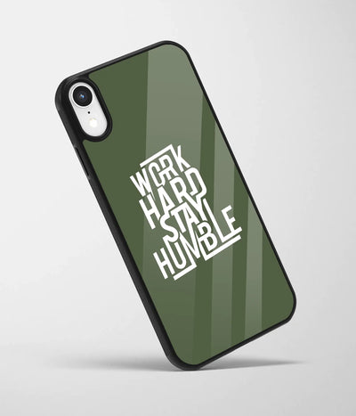 An angled view of a glass phone case featuring a vibrant design.