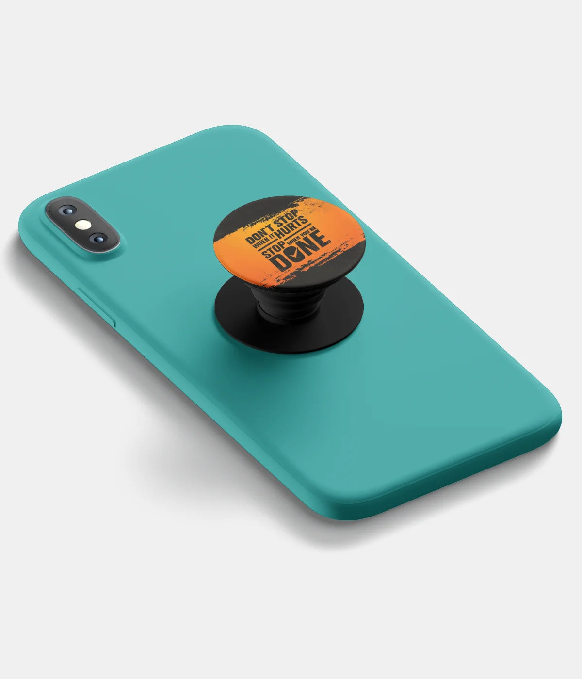 A top-down view of a phone grip holder attached to a mobile phone case on a white background