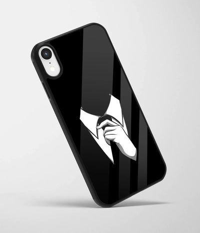 An angled view of a glass phone case featuring a vibrant design.