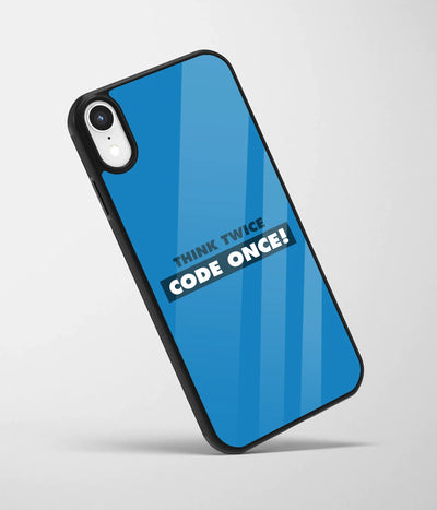 An angled view of a glass phone case featuring a vibrant design.