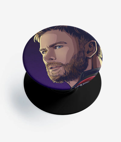 A top-down view of a phone grip holder on a clean white background