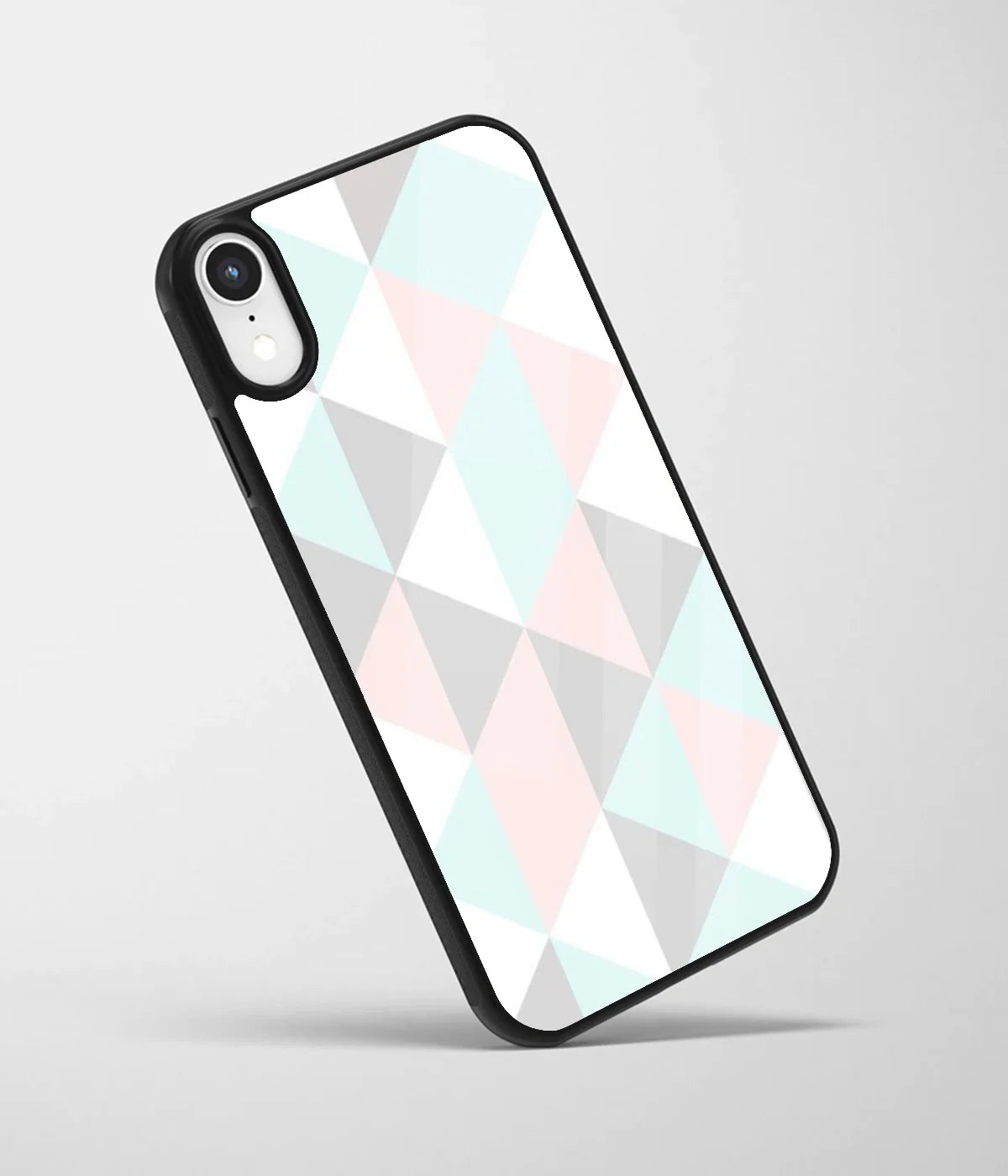 An angled view of a glass phone case featuring a vibrant design.