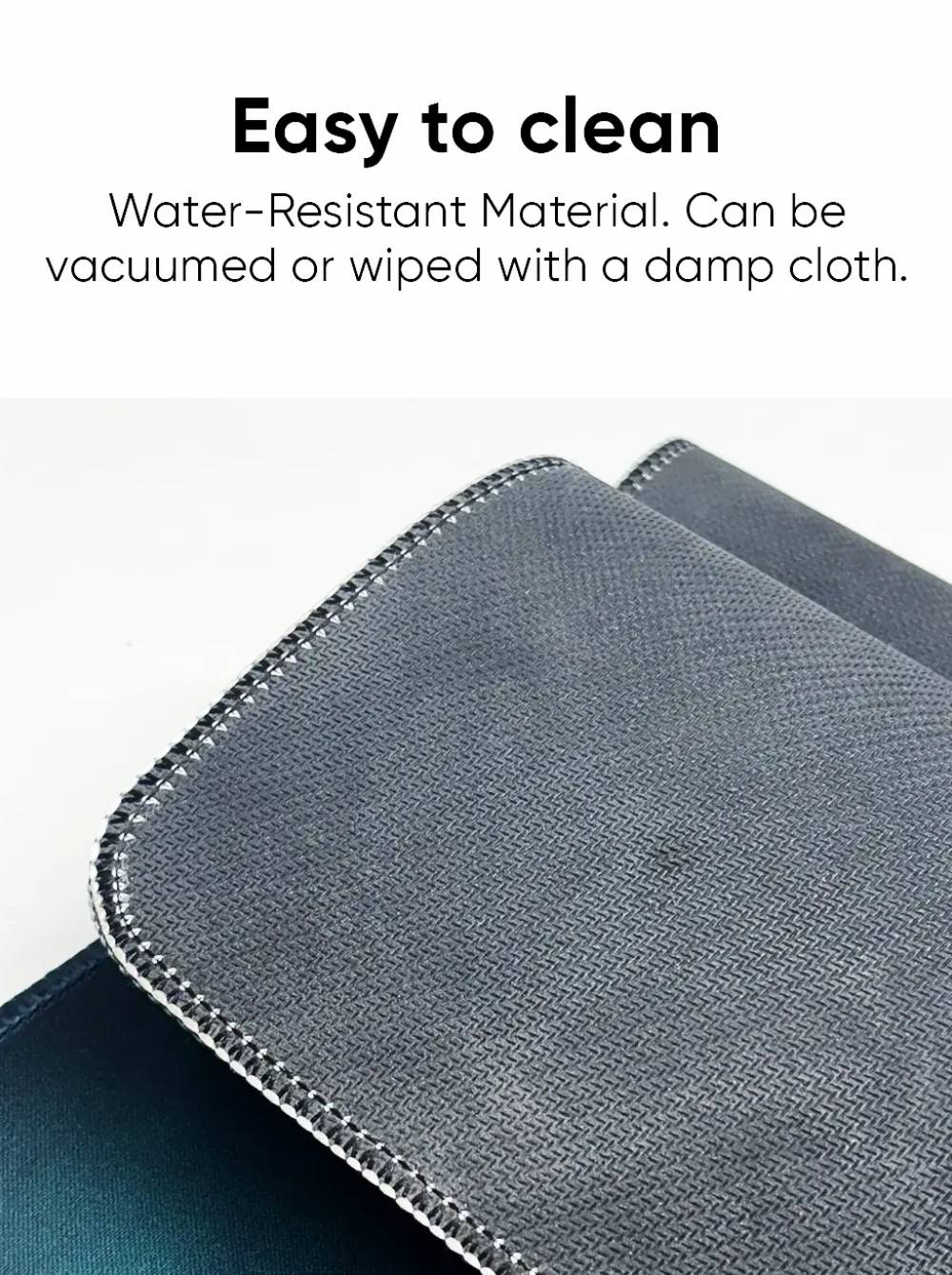 Close-up demonstrating the water-resistant material of the desk mat.