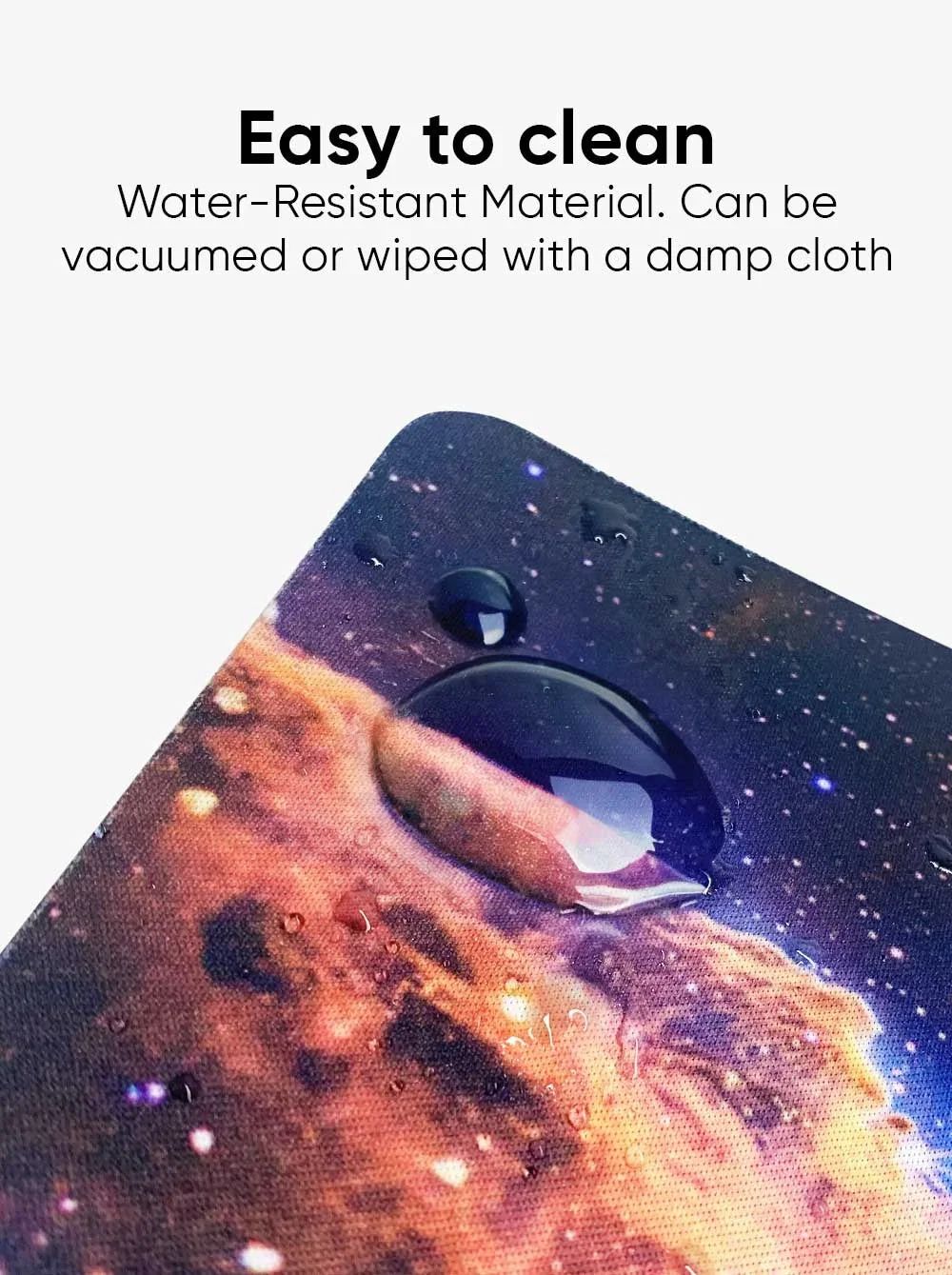 Close-up feature shot demonstrating the water-resistant material of the desk mat.