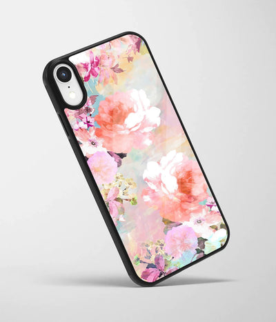 An angled view of a glass phone case featuring a vibrant design.