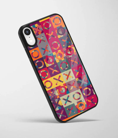 An angled view of a glass phone case featuring a vibrant design.