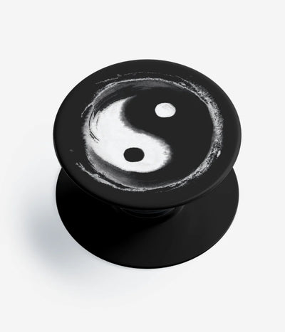 A top-down view of a phone grip holder on a clean white background