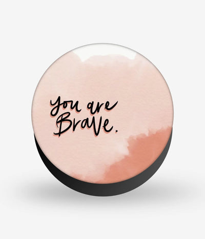 Mobile phone grip with a colorful design on a white background